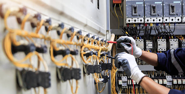 Professional Electrician technician working in Twin City, GA